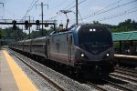 Eastbound "Regional" races through the station